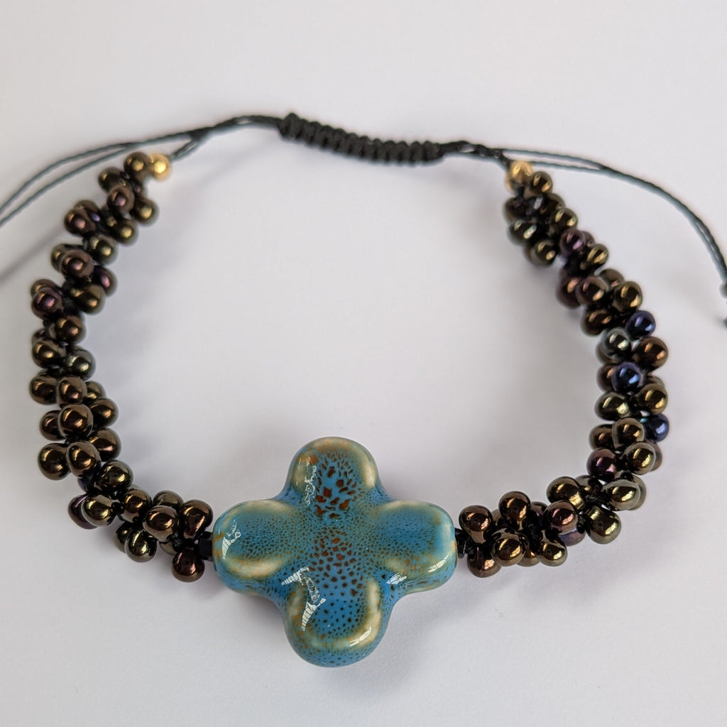 Skadi cross croix bleu et irisé